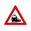 Railway level crossing without gate or barrier ahead
