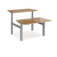 Elev8 Touch sit-stand back-to-back desks 1200mm x 1650mm - silver frame and oak