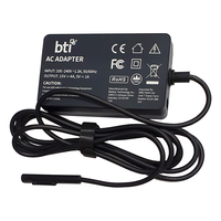Origin Storage BTI 65W AC Adapter for Microsoft Surface Pro 4 and Surface Pro 5. UK including 5V USB-A output