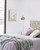 Vloerlamp Damila in metaal wit en rotan met natuurlijke finish
