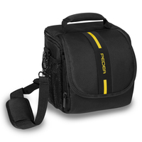 PEDEA Kameratasche Gr. M ESSEX Foto Tasche mit Regenschutz und Zubehörfächer, schwarz/gelb