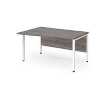 Maestro 25 left hand wave desk 1400mm wide - white bench leg frame and grey oak