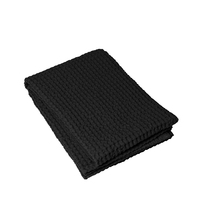 Badetuch -CARO- Black 70 x 140 cm. Material: Baumwolle. Von Blomus. Für ein