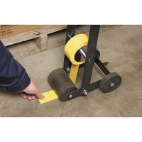 Line marking tape applicator